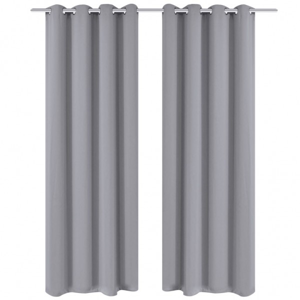 2 cortinas grises oscuras con anillas metálicas. blackout 135 x 245 cm D