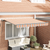 Toldo Retráctil Manual Amarillo y naranja y blanco 1